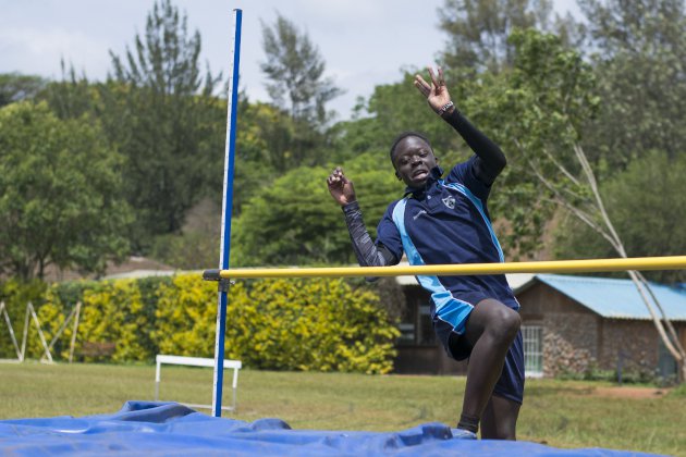 Child practicing the high jump